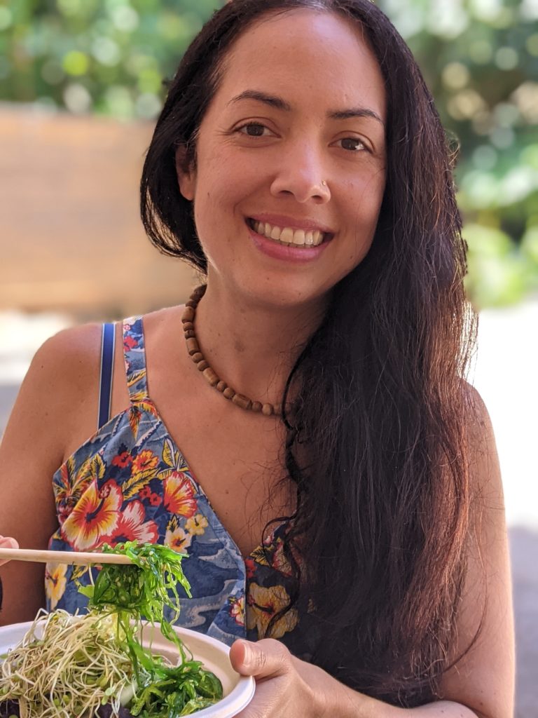 Chef Veggie Cristina Carolan at Kauai Poke Co eating a sweet potato poke bowl
Vegan Kauai Eats