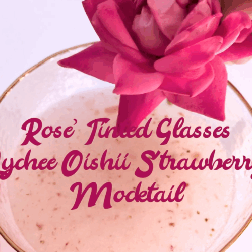 A lychee and strawberry mocktail using Apothekary's Rose' Tinted Glasses tincture for delicious mood support